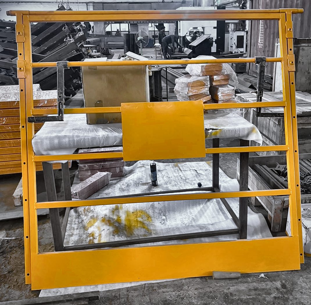 Freshly powder-coated bar-type barricade in the workshop